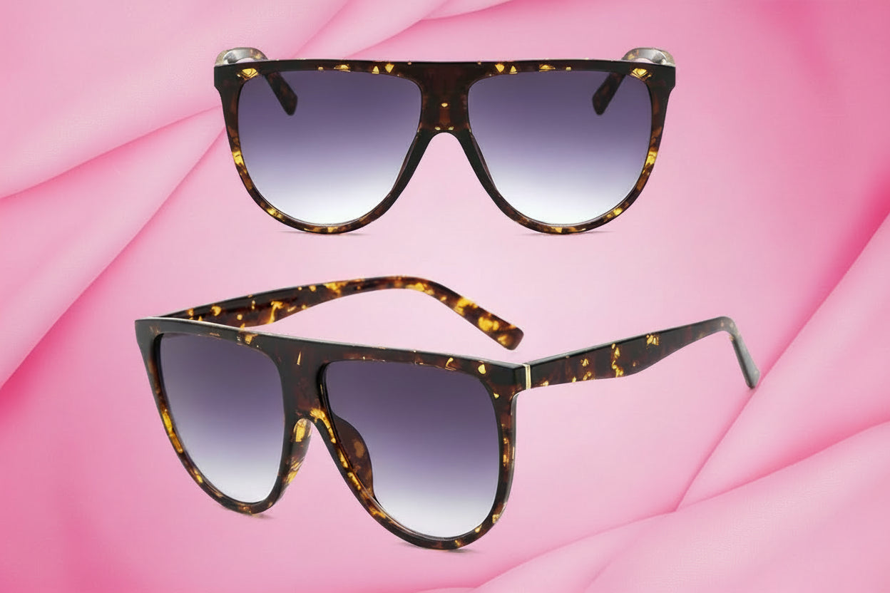 Tortoiseshell sunglasses with gradient lenses on a white background