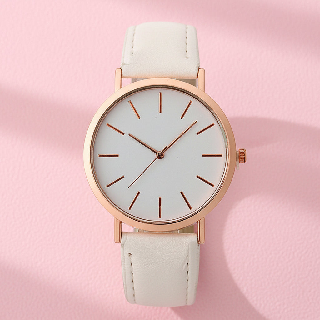 Wristwatch with rose gold case and beige strap on white background