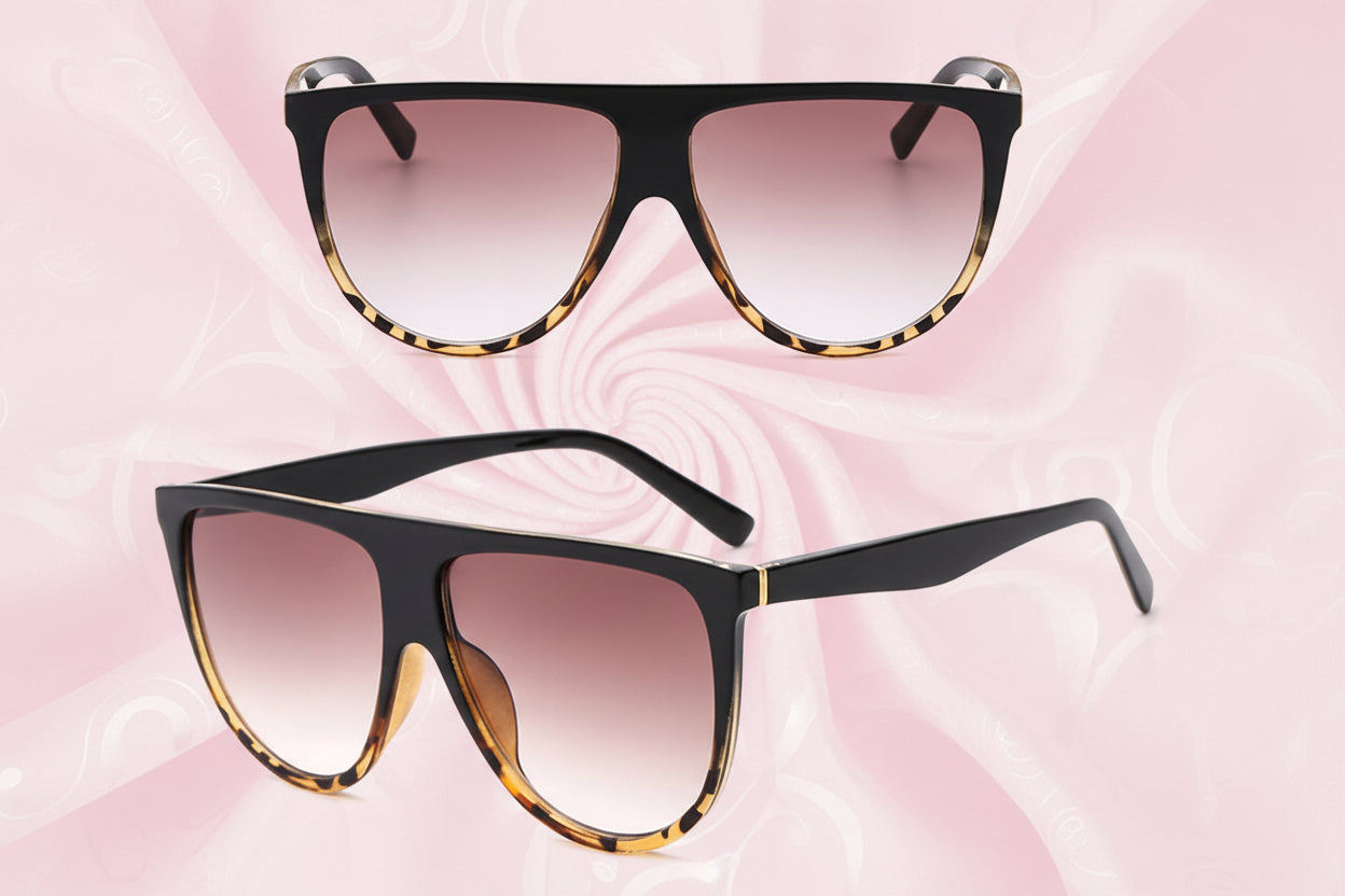 Black and tortoiseshell sunglasses with gradient lenses on a white background