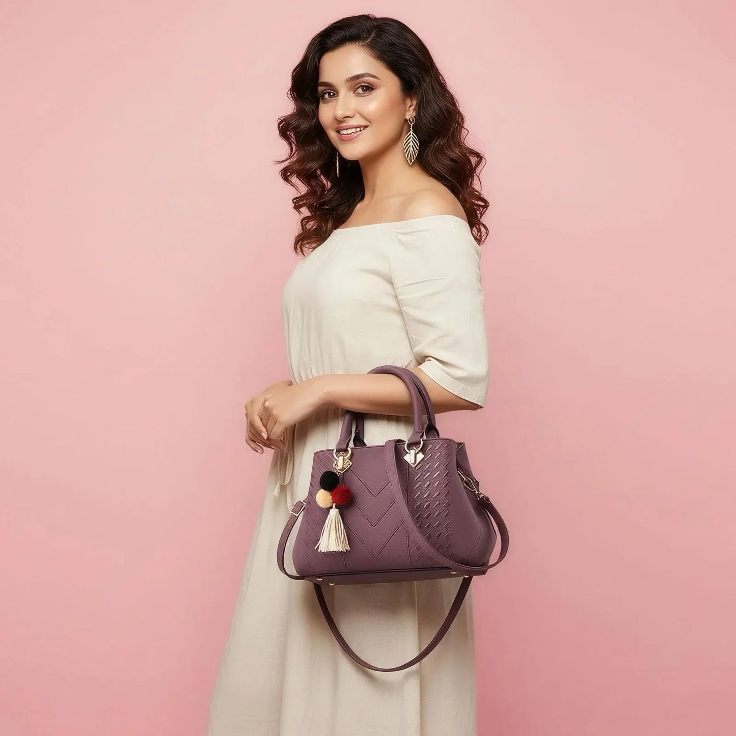 Woman holding a purple handbag against a pink background
