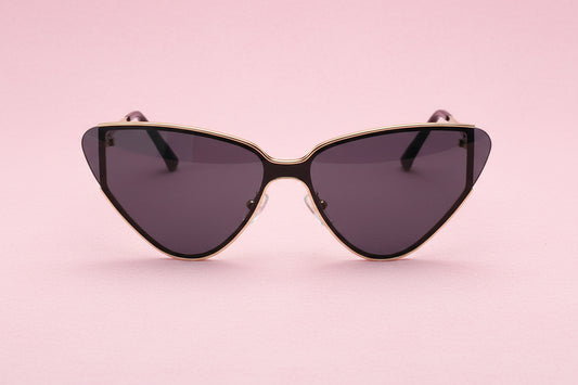 Cat-eye sunglasses with gold frame and dark lenses on a white background